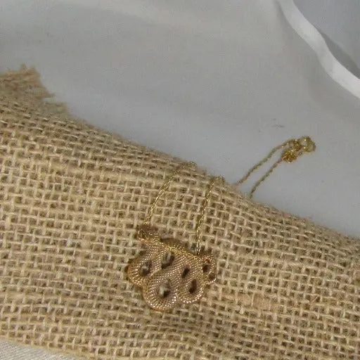 Bronze Snake Festoon Pendant on Gold Chain
